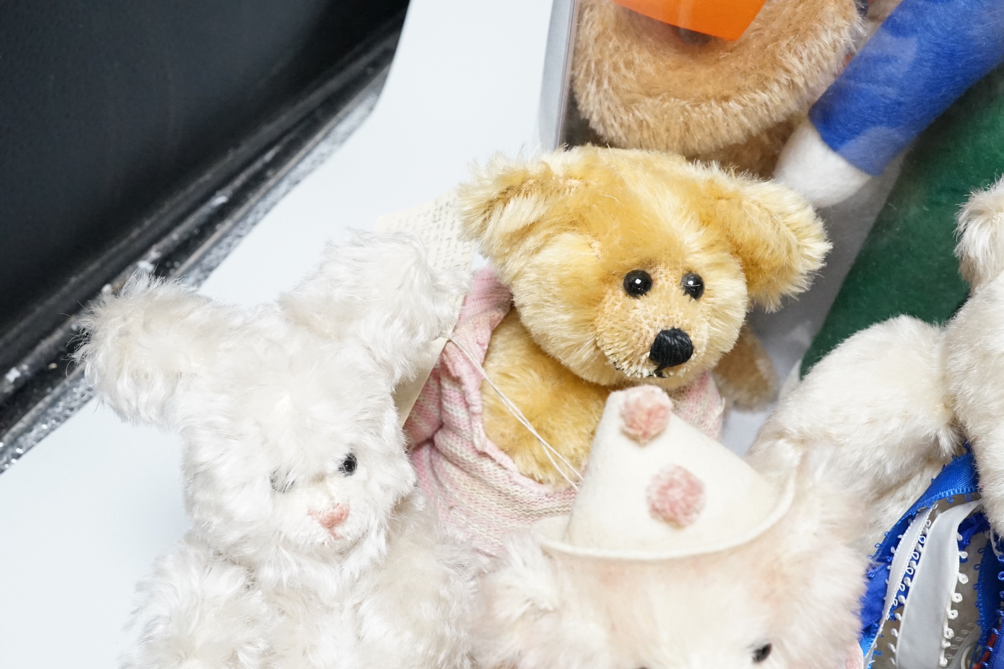 A Merrythought teddy and golly, boxed, with five artist's bears